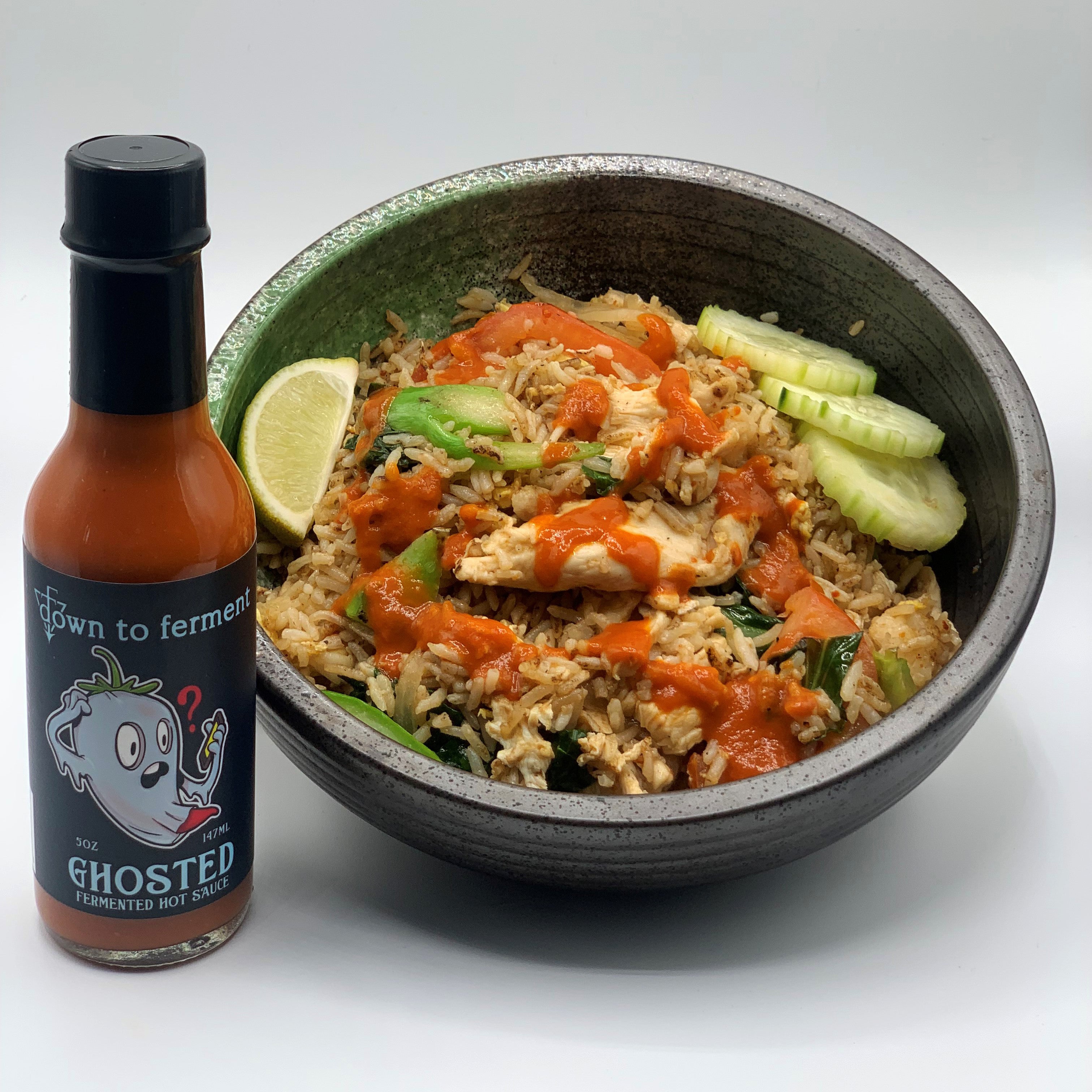 Ghosted Hot Sauce in a fried rice bowl. Down To Ferment vegan hot sauce - San Diego's Hot Sauce